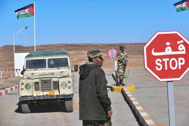 A flag of the Sahrawi Arab Democratic Republic, proclaimed by the separatist Polisario Front, flies at a checkpoint manned by Sahrawi security forces outside a refugee camp, about 170km southeast of the Algerian city of Tindouf