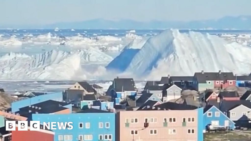 Giant iceberg turns over near Greenland’s coast